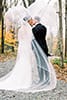 Kissing in the Rain | Rustic New England Weddings